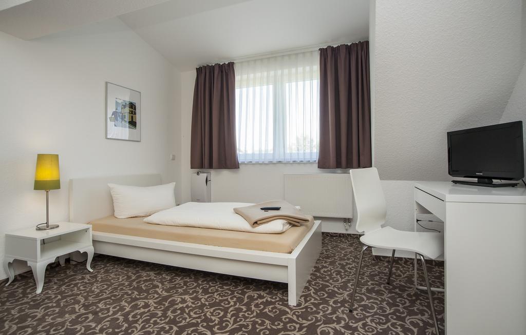 Pension Lok-Inn Walluf Oda fotoğraf